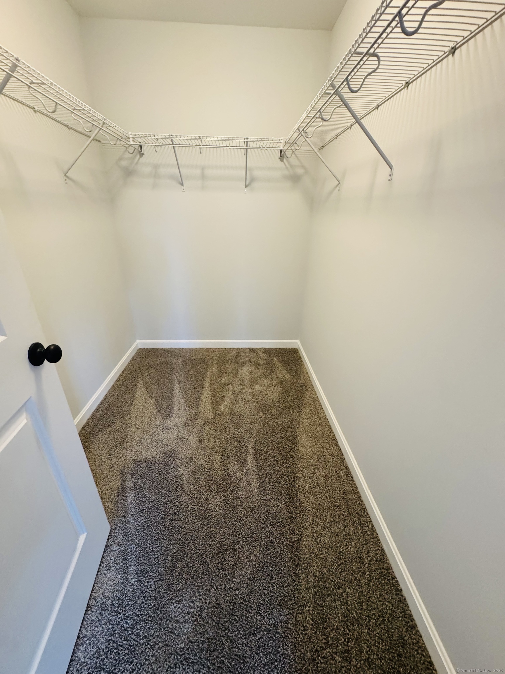 160 Ross Road Brooklyn, CT 06234 - Photo 12 of 13 a view of a room with racks on the wall