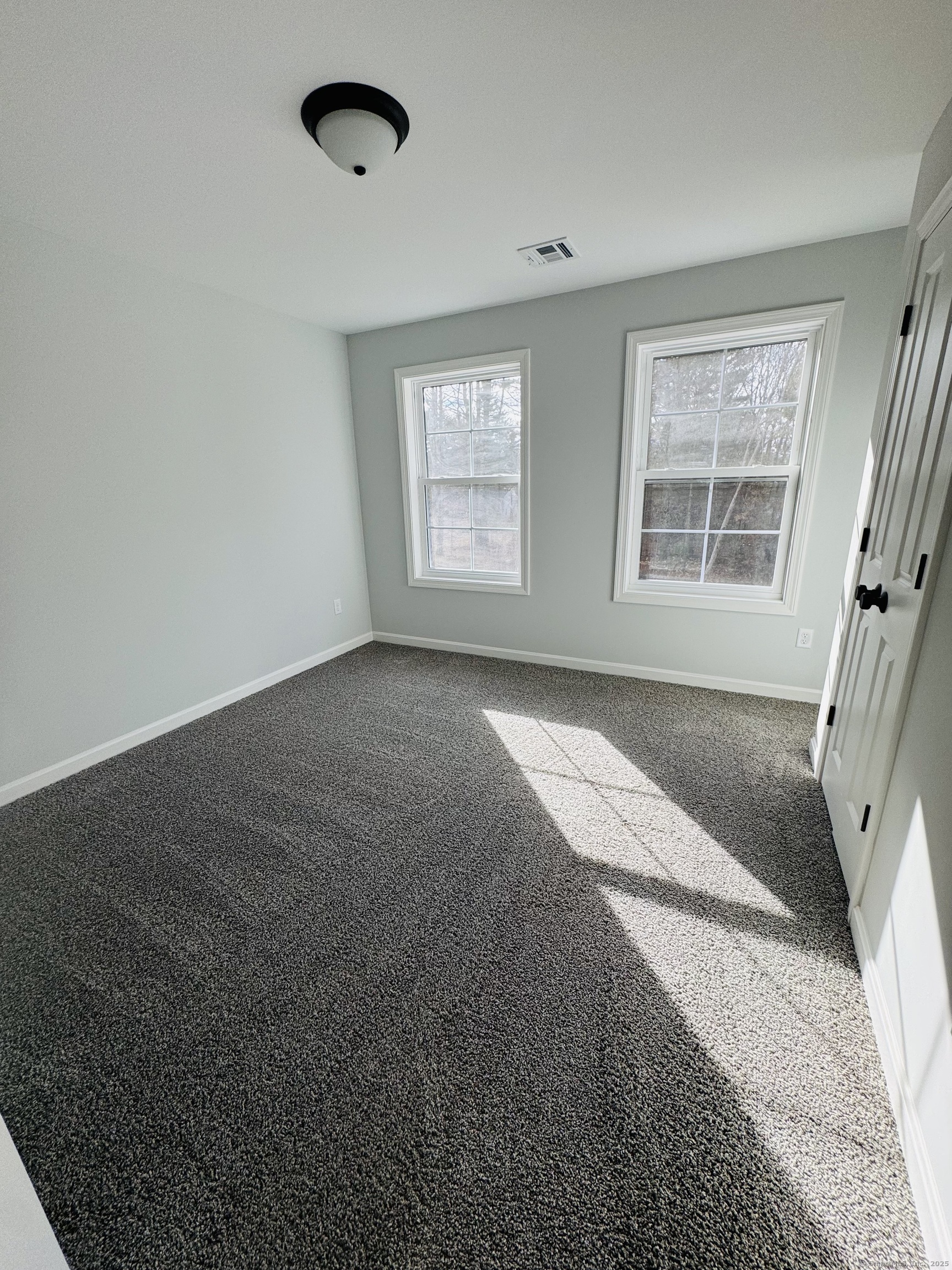 160 Ross Road Brooklyn, CT 06234 - Photo 9 of 13 a view of an empty room with a window