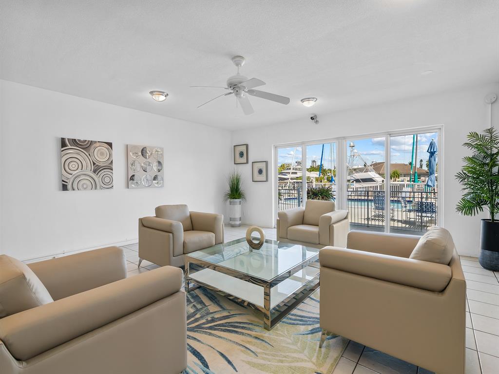 1475 Southeast 15th Street, Unit 311 Fort Lauderdale, FL 33316 - Photo 19 of 19 a living room with furniture and a large window