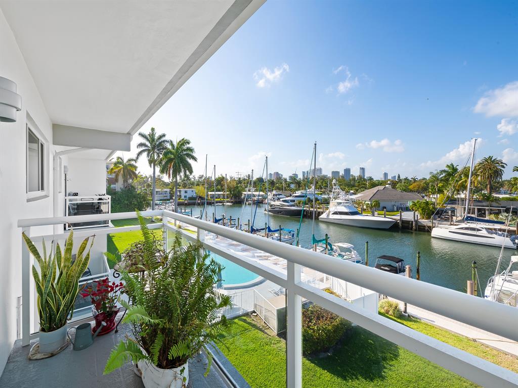 1475 Southeast 15th Street, Unit 311 Fort Lauderdale, FL 33316 - Photo 3 of 19 a view of a lake with a terrace