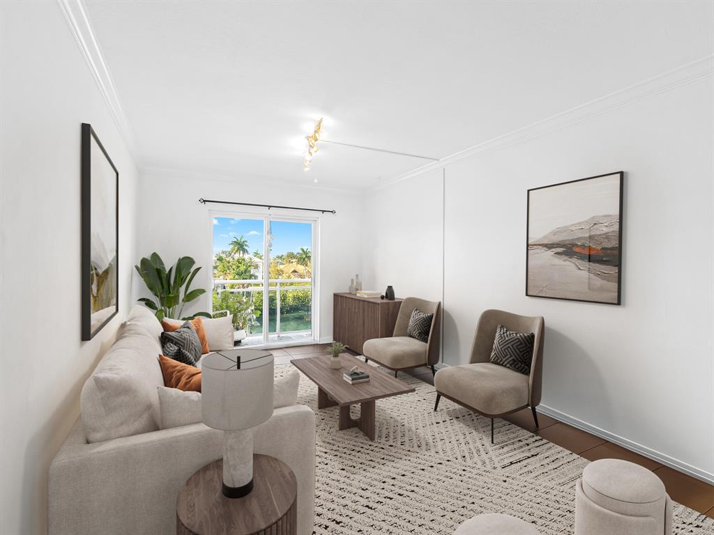 1475 Southeast 15th Street, Unit 311 Fort Lauderdale, FL 33316 - Photo 4 of 19 a living room with furniture and a potted plant
