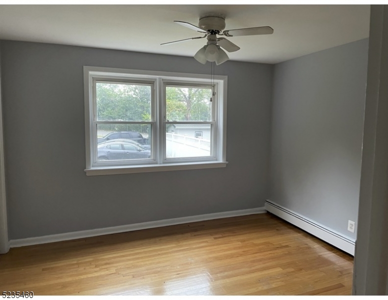 357 Franklin Street, Unit 5 Bloomfield, NJ 07003 - Photo 3 of 4 a view of empty room with ceiling fan