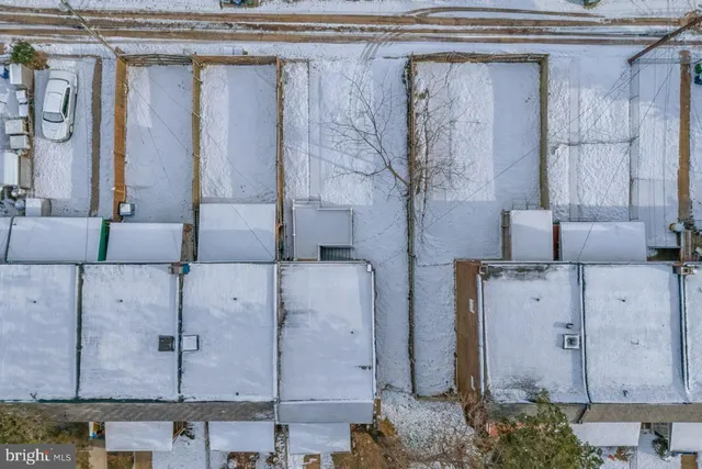 an aerial view of a house with a ocean view