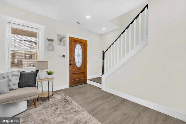 a view of livingroom with furniture and windows