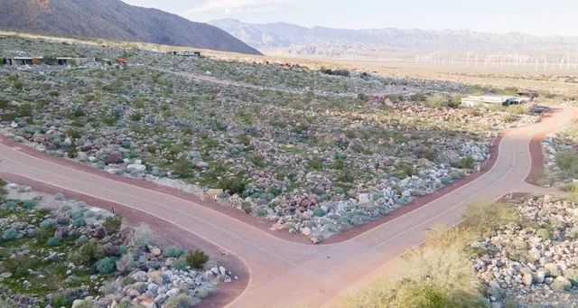 an aerial view of beach and an ocean