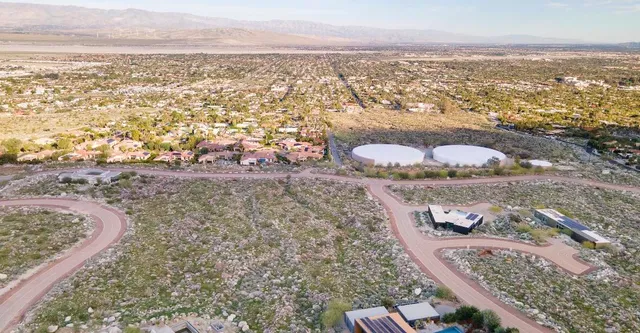 a view of an ocean and a mountain