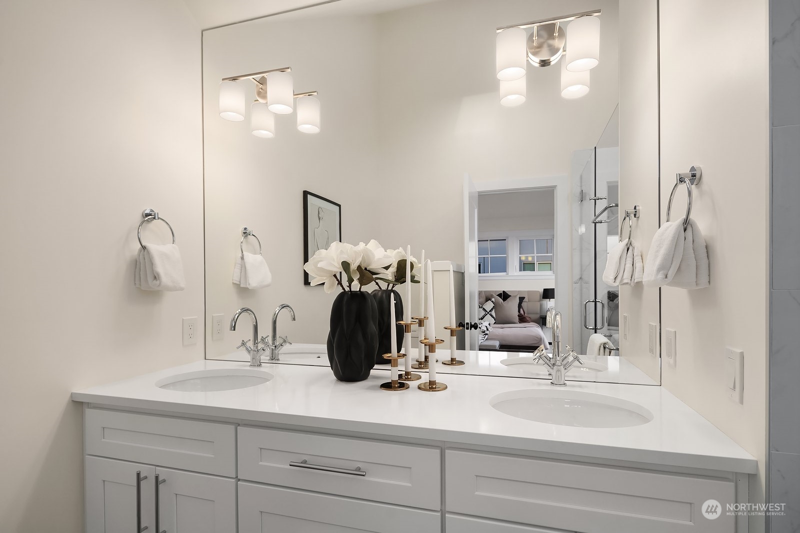 706 North 76th Street Seattle, WA 98103 - Photo 20 of 38 a bathroom with a sink and a mirror
