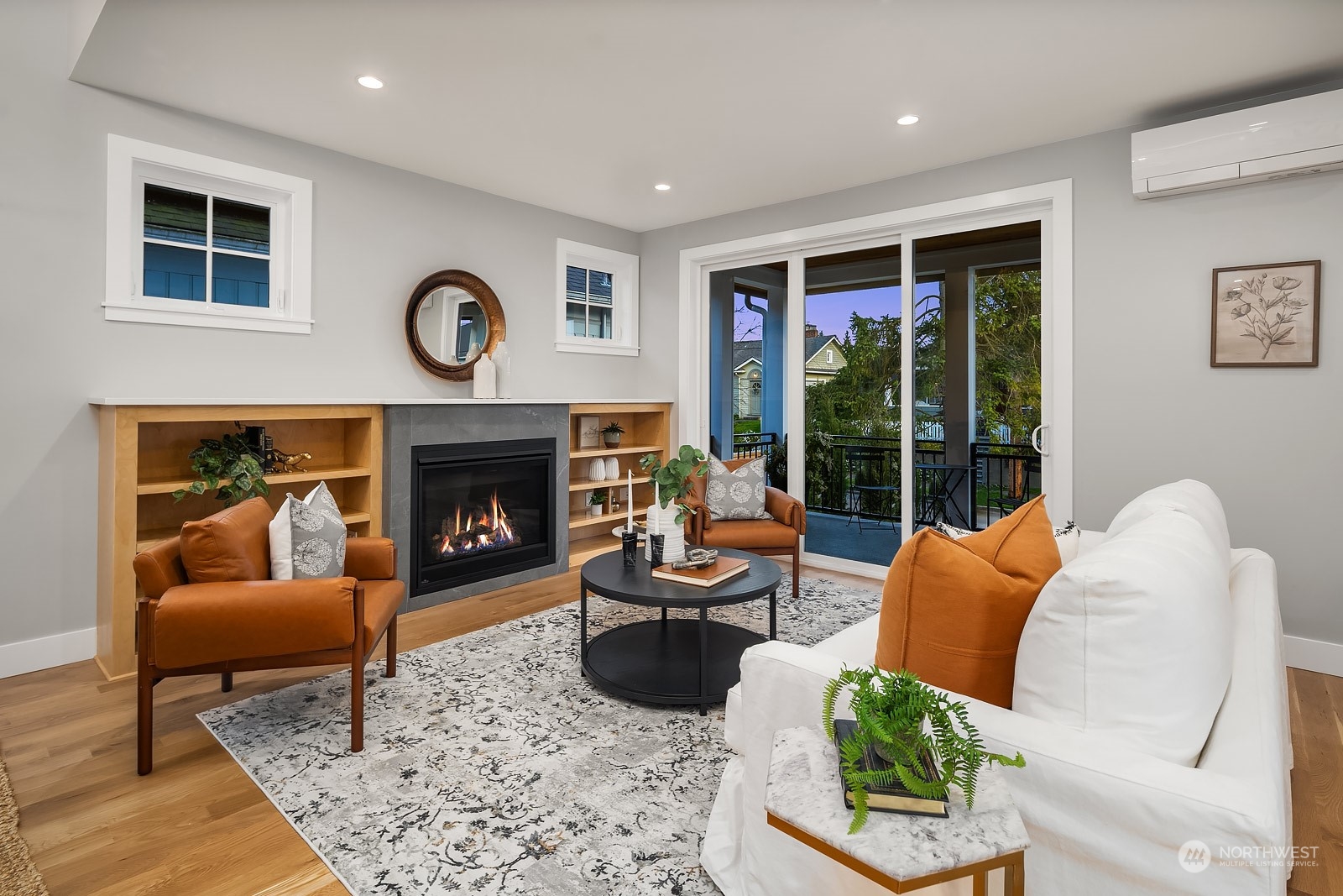 706 North 76th Street Seattle, WA 98103 - Photo 4 of 38 a living room with furniture and a fireplace