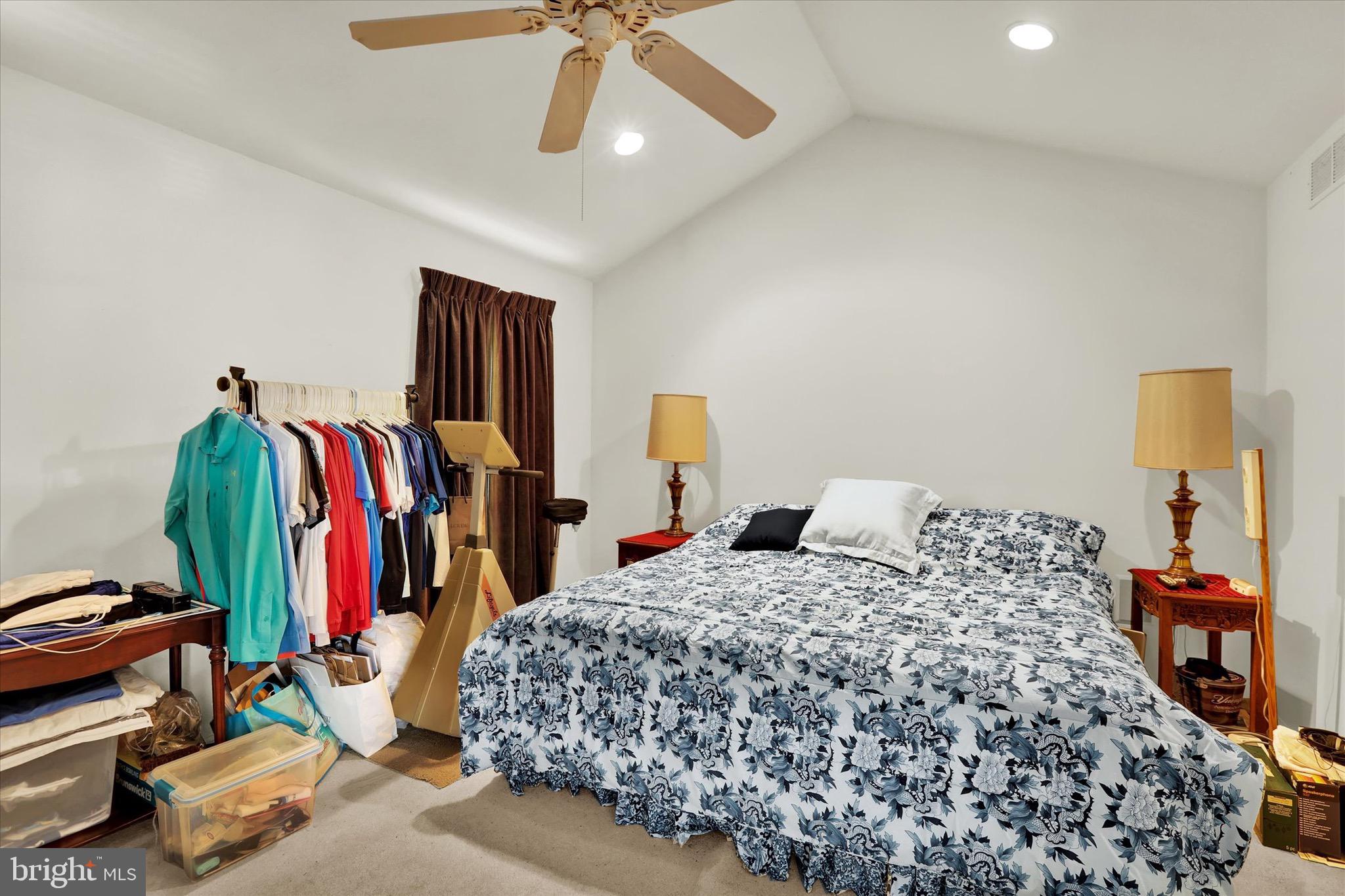 5 Brownstone Road Hightstown, NJ 08520 - Photo 13 of 21 a bedroom with a bed and a walk in closet