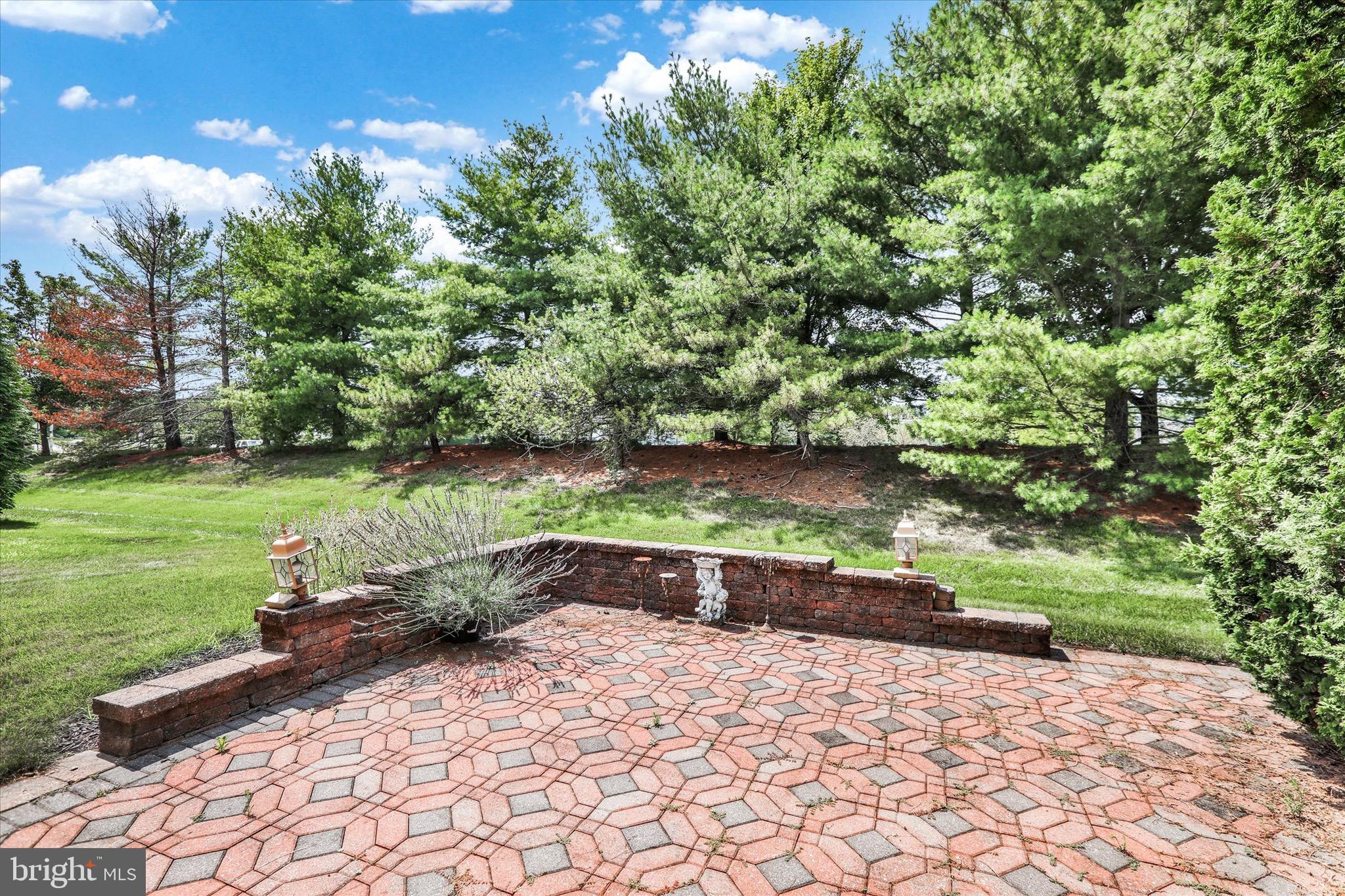 5 Brownstone Road Hightstown, NJ 08520 - Photo 20 of 21 a street view with a bench