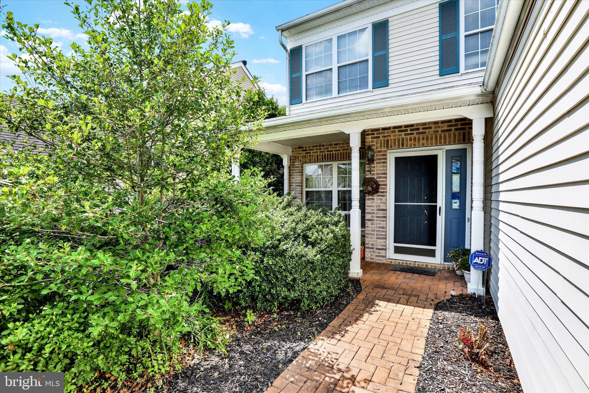 5 Brownstone Road Hightstown, NJ 08520 - Photo 2 of 21 front view of a house with a yard