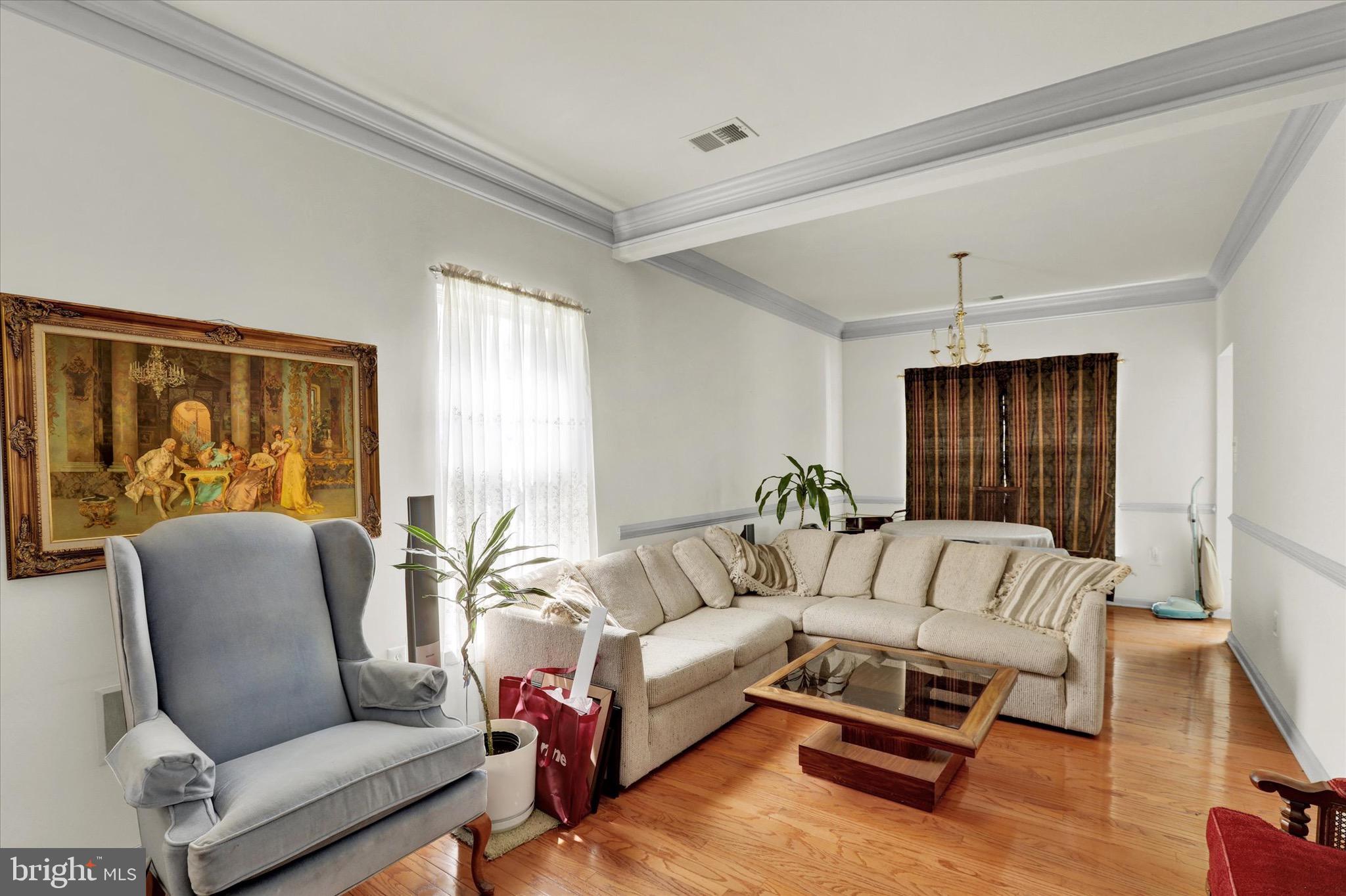 5 Brownstone Road Hightstown, NJ 08520 - Photo 5 of 21 a living room with furniture and a large window