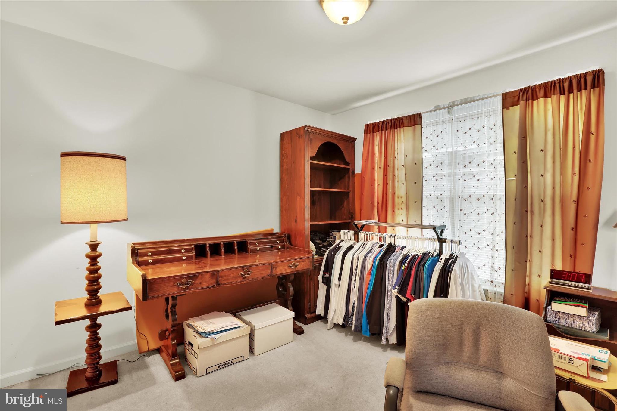 5 Brownstone Road Hightstown, NJ 08520 - Photo 6 of 21 a living room with a couch and a window