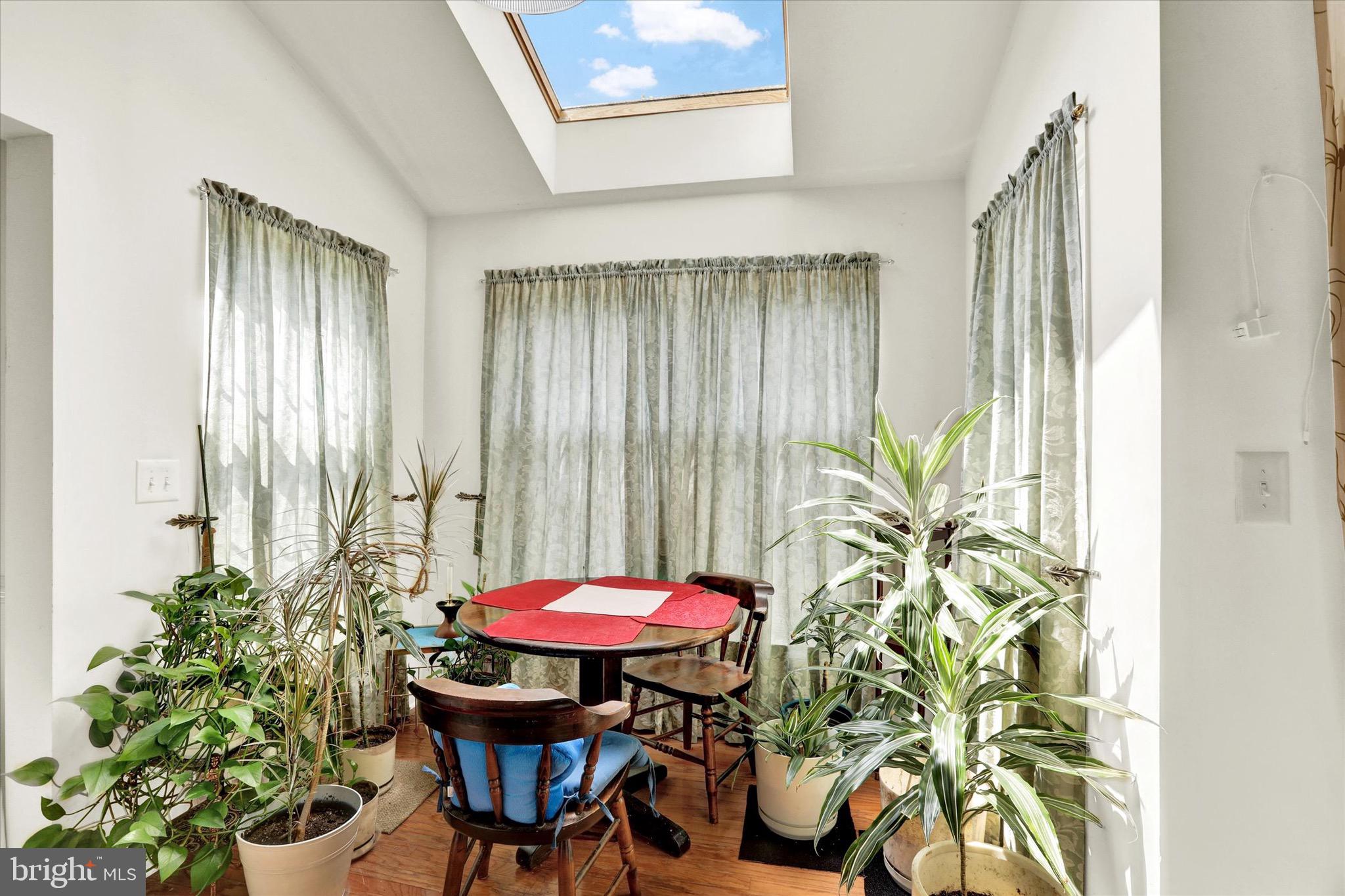 5 Brownstone Road Hightstown, NJ 08520 - Photo 9 of 21 a table and chair sitting in a balcony
