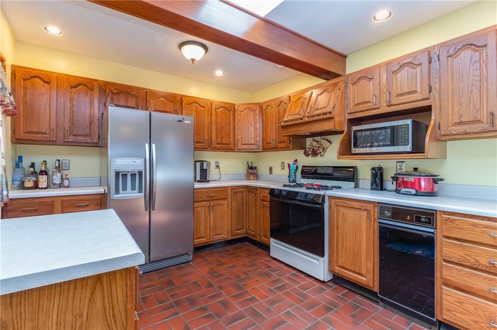 410 Ohio Avenue Rochester, PA 15074 - Photo 2 of 23 Beautiful Kitchen with Stainless refrigerator, gas stove, dishwasher and trash compactor.