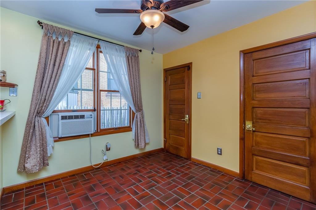 410 Ohio Avenue Rochester, PA 15074 - Photo 7 of 23 Kitchen area with large pantry and ceiling fan, Window A/C included.