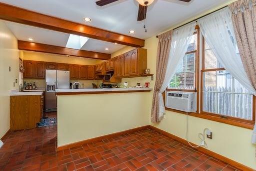 410 Ohio Avenue Rochester, PA 15074 - Photo 8 of 23 Eat-In Kitchen, Ceramic Tile, Breakfast Bar and Sky Light.