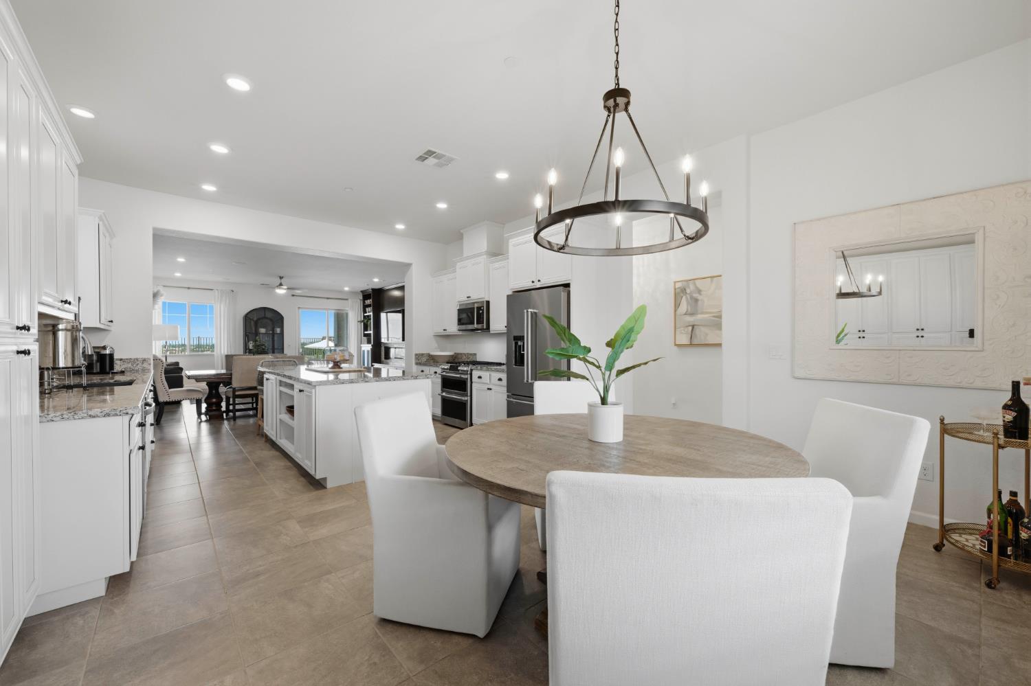 2259 Ranch View Drive Rocklin, CA 95765 - Photo 12 of 54 dining area with a chandelier and ceiling fan
