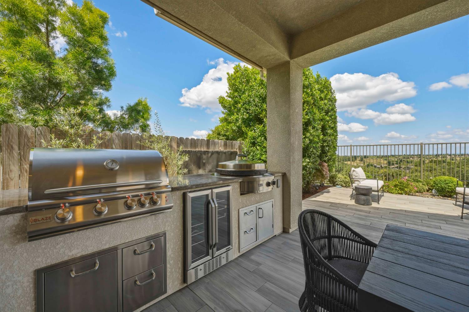 2259 Ranch View Drive Rocklin, CA 95765 - Photo 32 of 54 fenced backyard featuring an outdoor kitchen / dining area and wine cooler