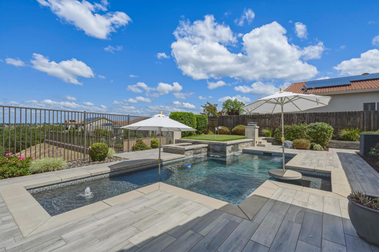 2259 Ranch View Drive Rocklin, CA 95765 - Photo 34 of 54 view of pool featuring a fenced backyard, patio surround, and an in-ground hot tub