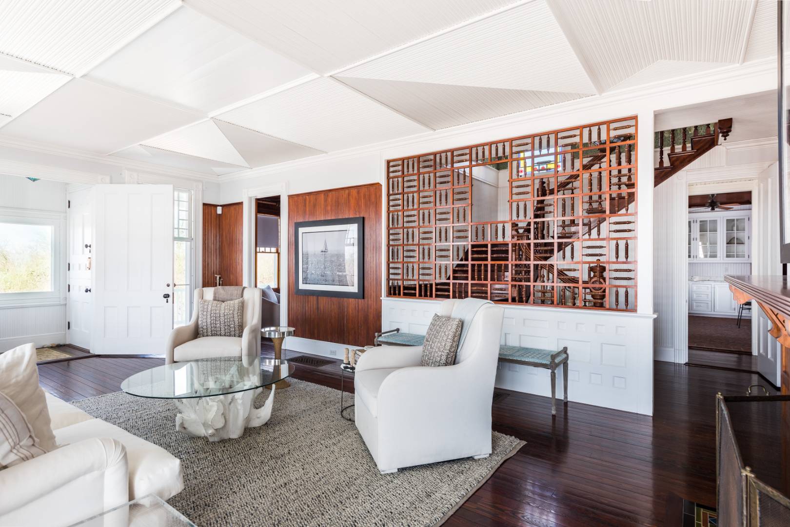 176 Deforest Road Montauk, NY 11954 - Photo 14 of 37 a living room with furniture and a floor to ceiling window