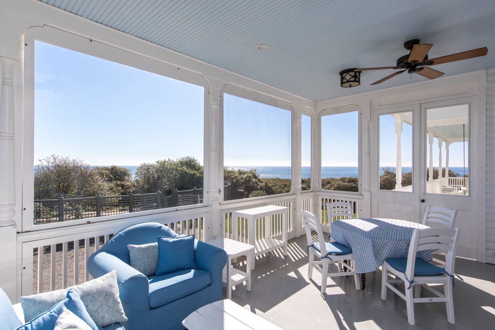 176 Deforest Road Montauk, NY 11954 - Photo 3 of 37 a living room with furniture large windows and wooden floor