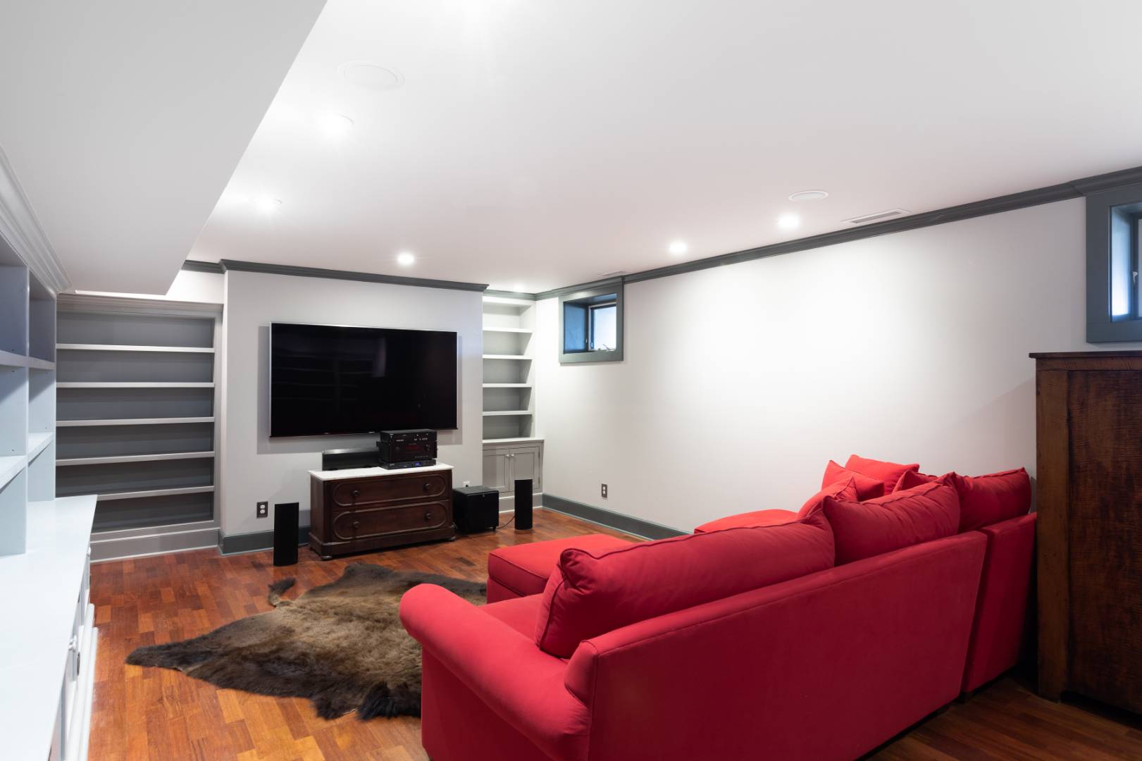 176 Deforest Road Montauk, NY 11954 - Photo 25 of 37 a living room with furniture and a flat screen tv