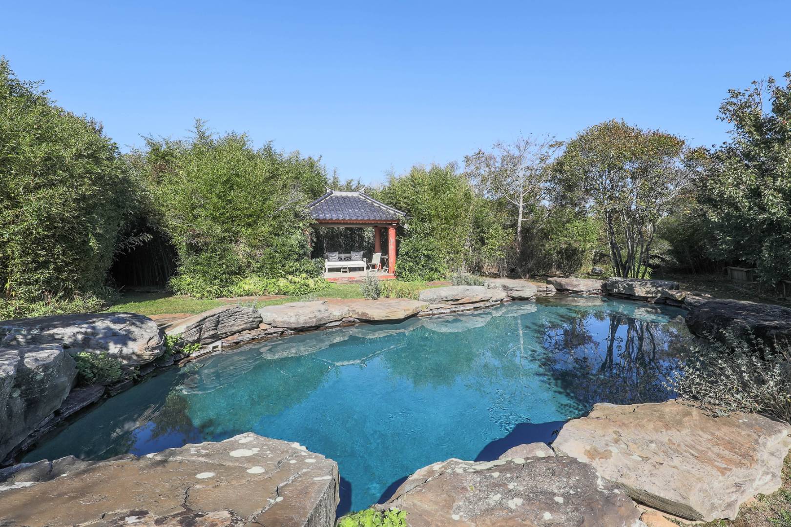 176 Deforest Road Montauk, NY 11954 - Photo 28 of 37 a view of a backyard with sitting area