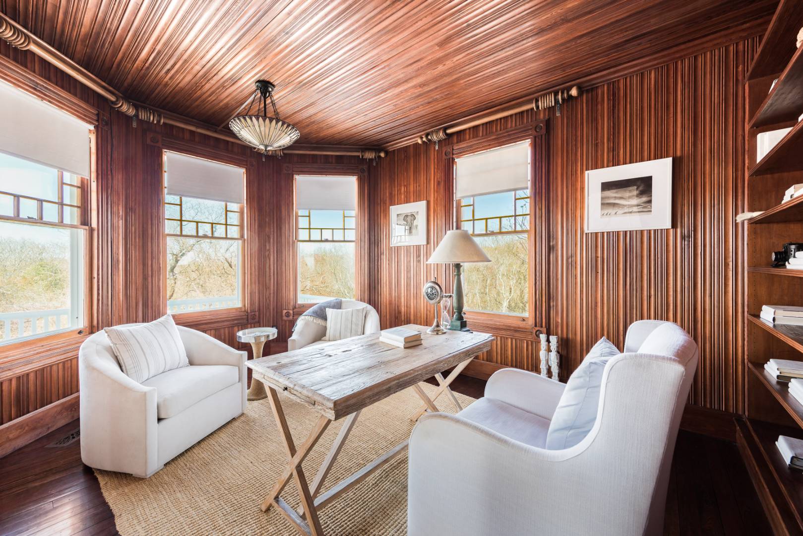 176 Deforest Road Montauk, NY 11954 - Photo 8 of 37 a living room with furniture and a large window