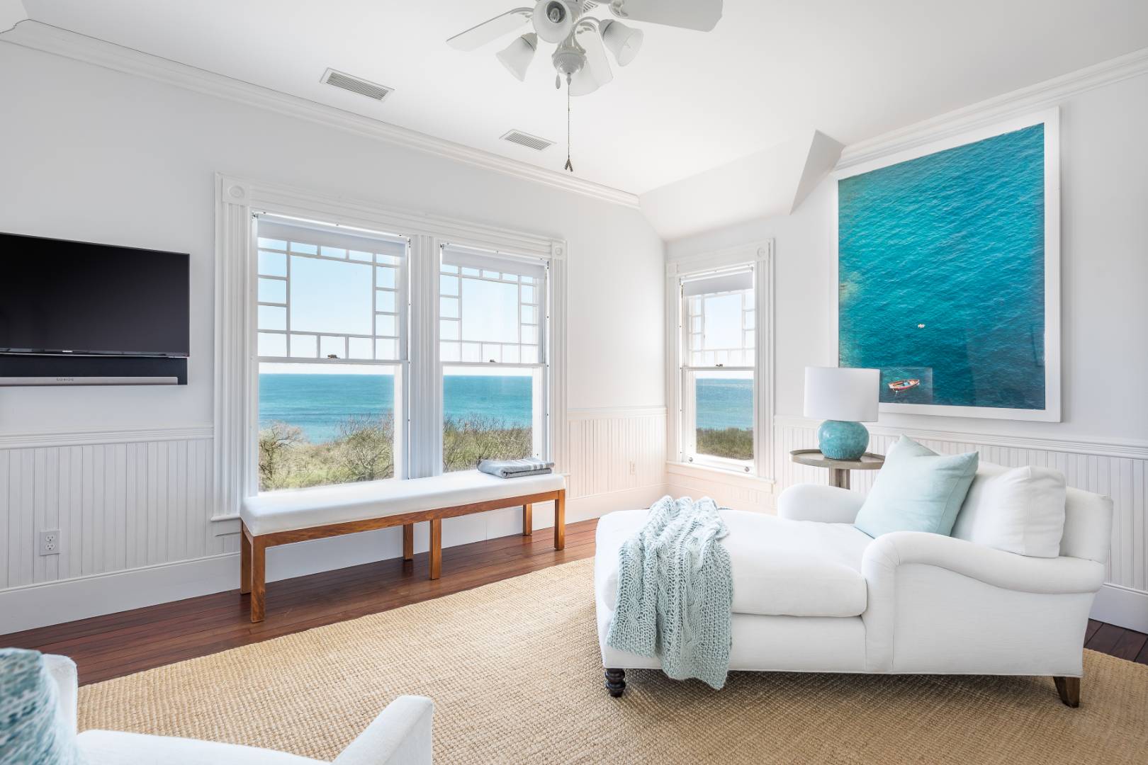 176 Deforest Road Montauk, NY 11954 - Photo 10 of 37 a living room with furniture and a flat screen tv