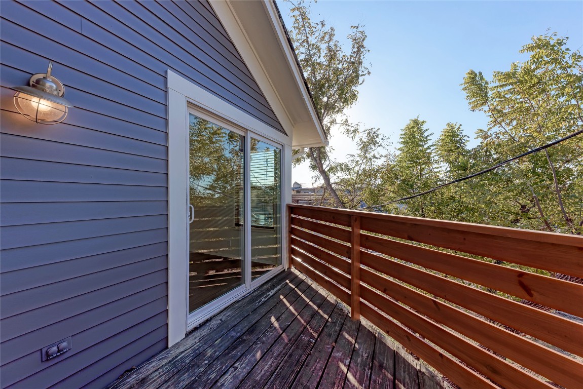 2106 Nickerson Street, Unit 203 Austin, TX 78704 - Photo 18 of 38 a view of balcony and wooden floor