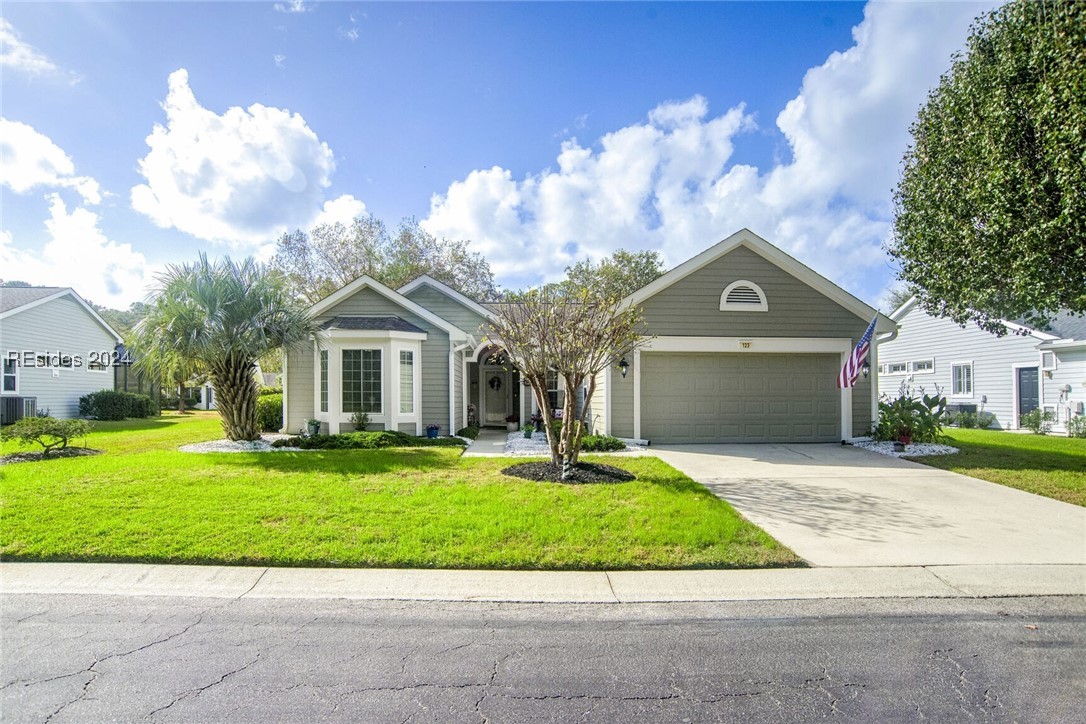 123 Commodore Dupont Street Okatie, SC 29909 - Photo 1 of 25 Single story home with a garage, cooling unit, and