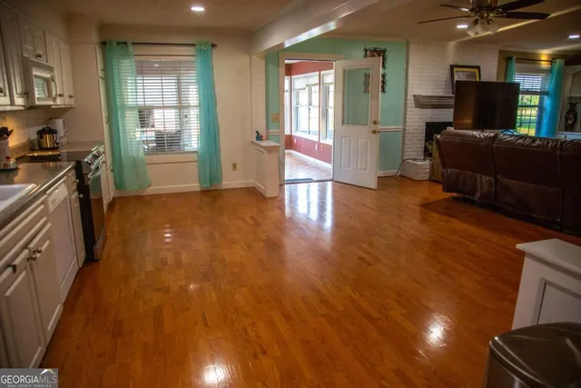 a view of livingroom with furniture and windows