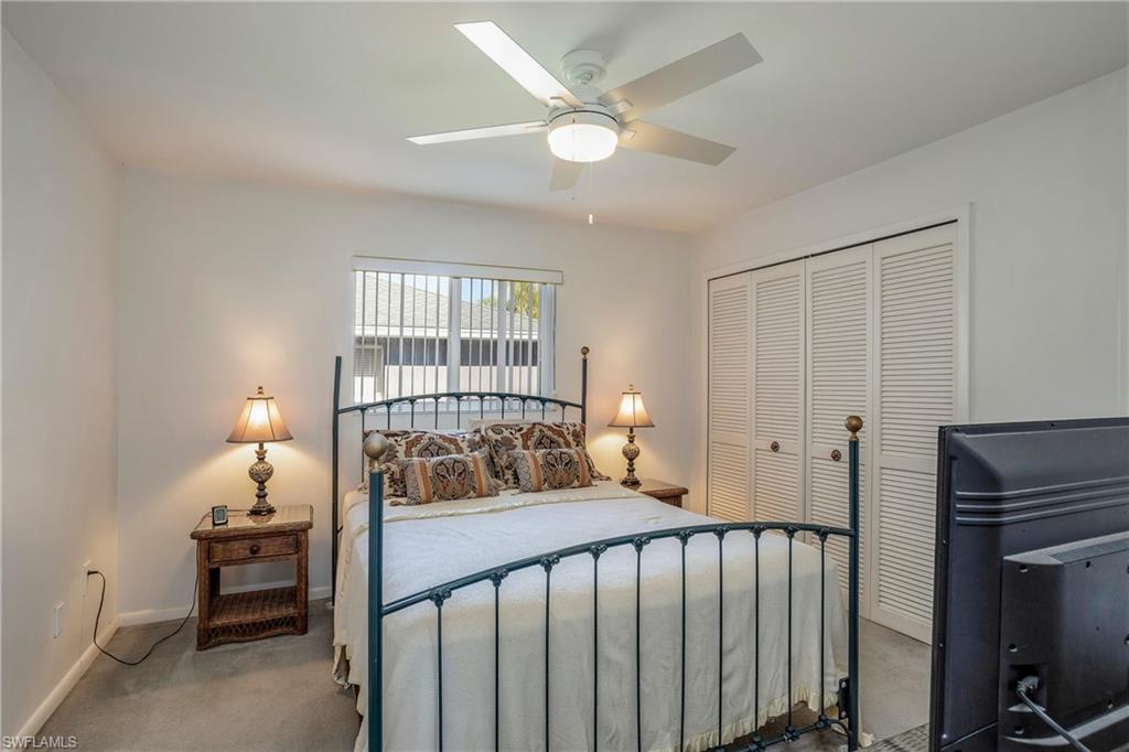 17509 Allentown Road Fort Myers, FL 33967 - Photo 12 of 20 a bedroom with a bed and a window