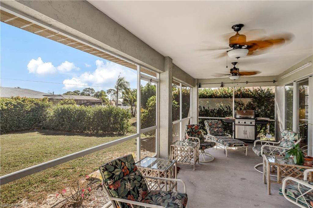 17509 Allentown Road Fort Myers, FL 33967 - Photo 17 of 20 a view of a porch with furniture and a potted plant