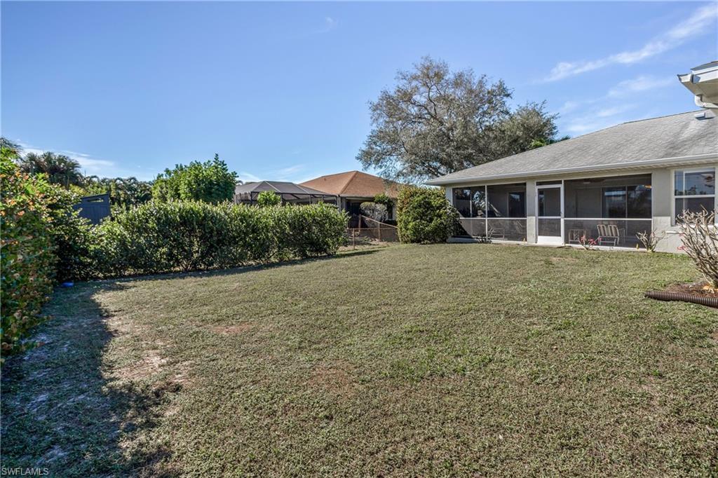 17509 Allentown Road Fort Myers, FL 33967 - Photo 20 of 20 a view of a house with backyard and trees