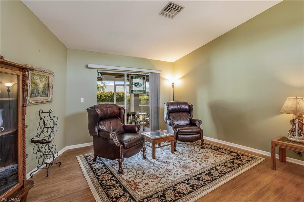 17509 Allentown Road Fort Myers, FL 33967 - Photo 3 of 20 a living room with furniture and a rug