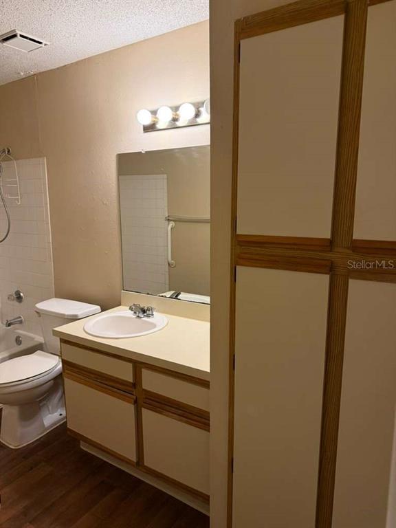 199 Afton Square, Unit 103 Altamonte Springs, FL 32714 - Photo 12 of 21 a bathroom with a sink and mirror