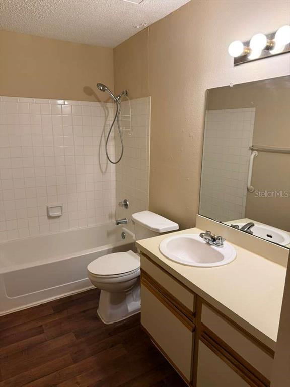 199 Afton Square, Unit 103 Altamonte Springs, FL 32714 - Photo 13 of 21 a bathroom with a sink a toilet and shower