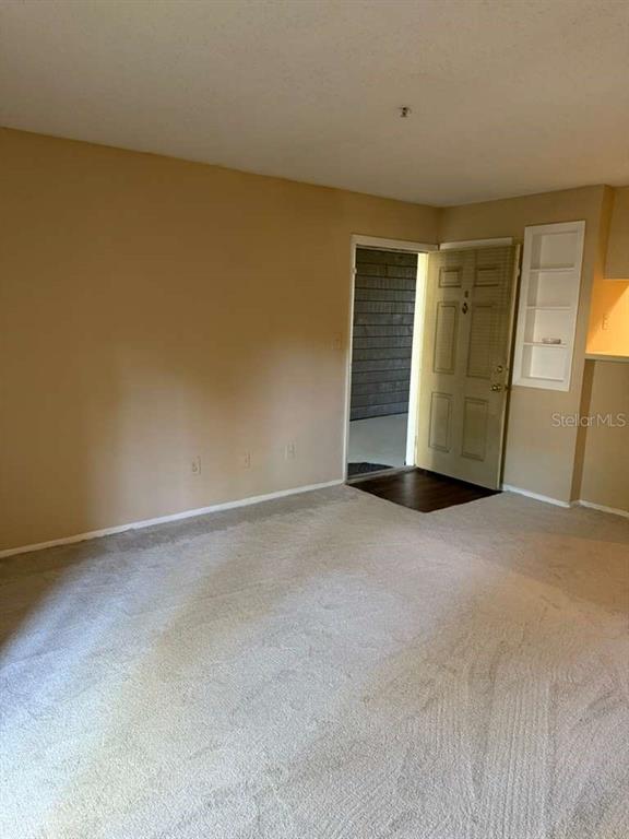 199 Afton Square, Unit 103 Altamonte Springs, FL 32714 - Photo 3 of 21 a view of an empty room