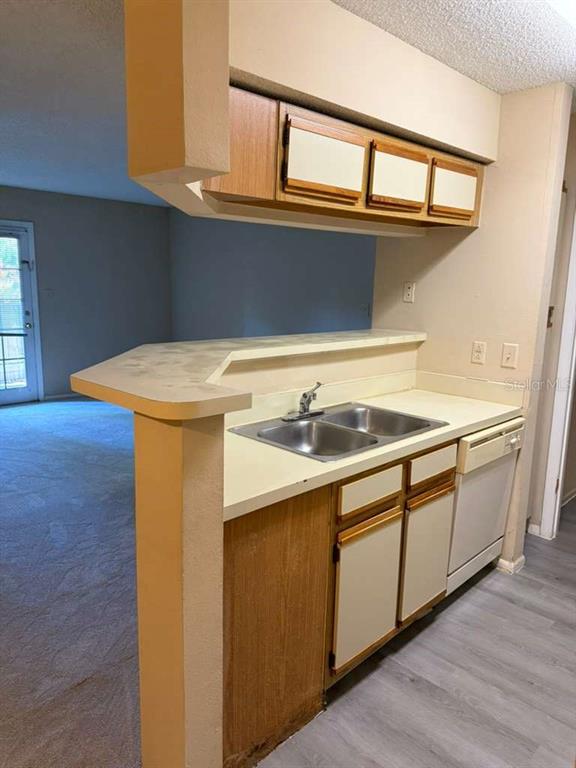 199 Afton Square, Unit 103 Altamonte Springs, FL 32714 - Photo 8 of 21 a utility room with dryer and washer