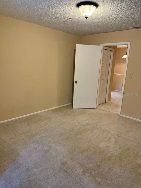 199 Afton Square, Unit 103 Altamonte Springs, FL 32714 - Photo 10 of 21 a view of an empty room