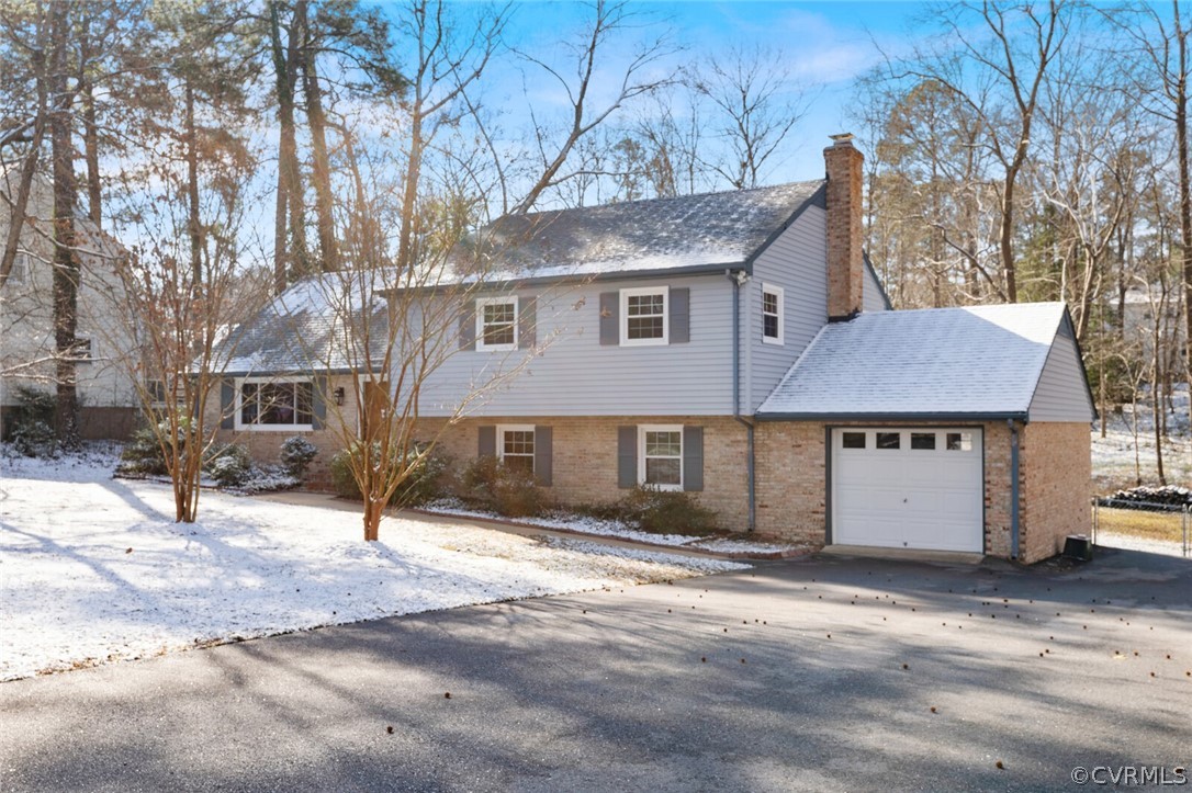 4541 Crossgate Road Chester, VA 23831 - Photo 1 of 47 a view of a house with a snow in the background