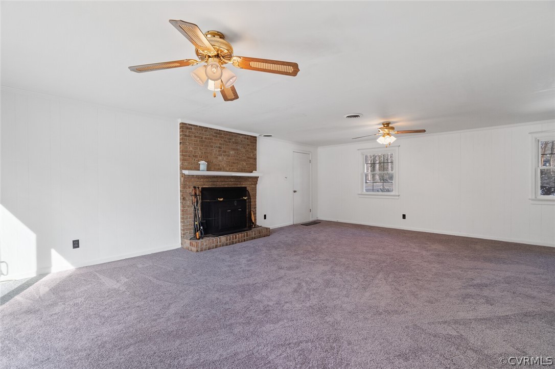 4541 Crossgate Road Chester, VA 23831 - Photo 22 of 47 a view of a livingroom with a ceiling fan and window