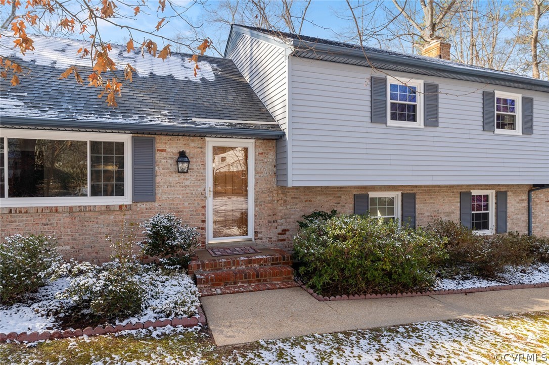 4541 Crossgate Road Chester, VA 23831 - Photo 3 of 47 a front view of a house with garden