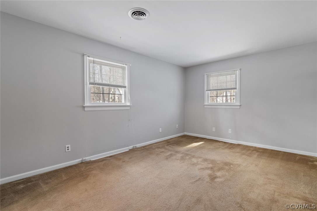 4541 Crossgate Road Chester, VA 23831 - Photo 32 of 47 an empty room with a window