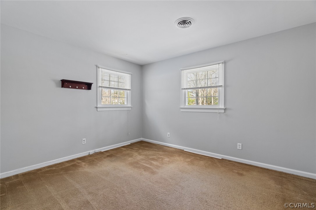 4541 Crossgate Road Chester, VA 23831 - Photo 36 of 47 an empty room with windows