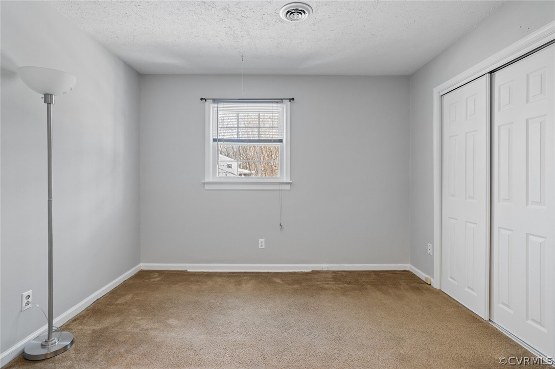 4541 Crossgate Road Chester, VA 23831 - Photo 37 of 47 an empty room with a window