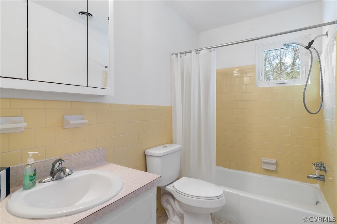 4541 Crossgate Road Chester, VA 23831 - Photo 39 of 47 a bathroom with a sink a toilet and shower