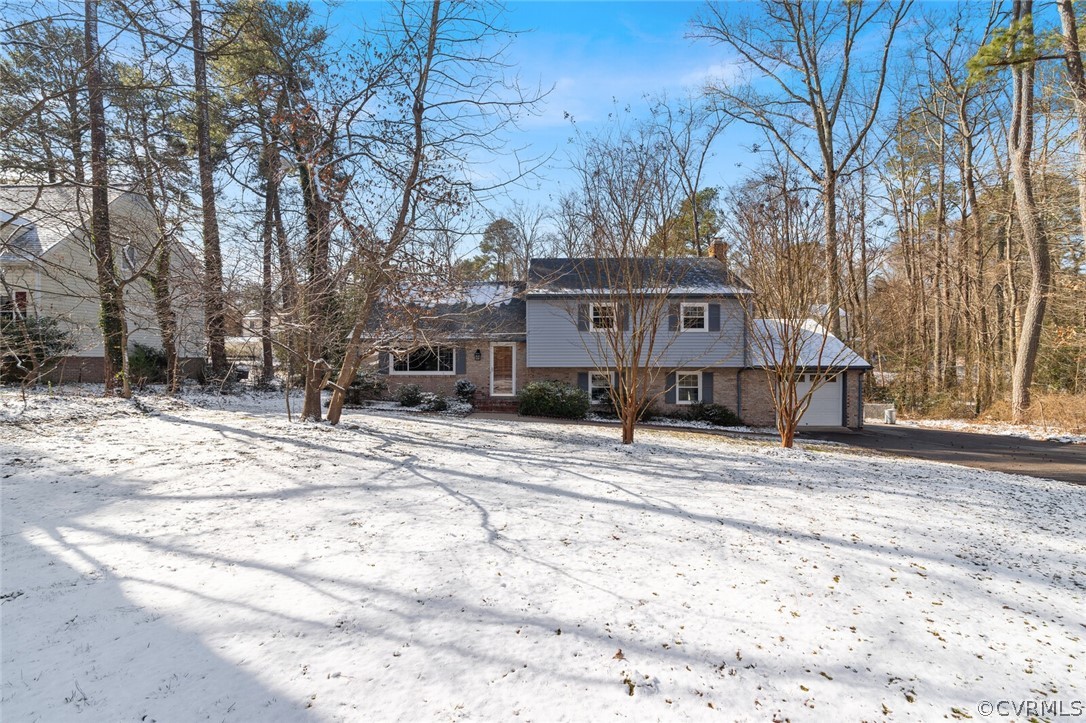4541 Crossgate Road Chester, VA 23831 - Photo 5 of 47 a view of a house with snow on the road